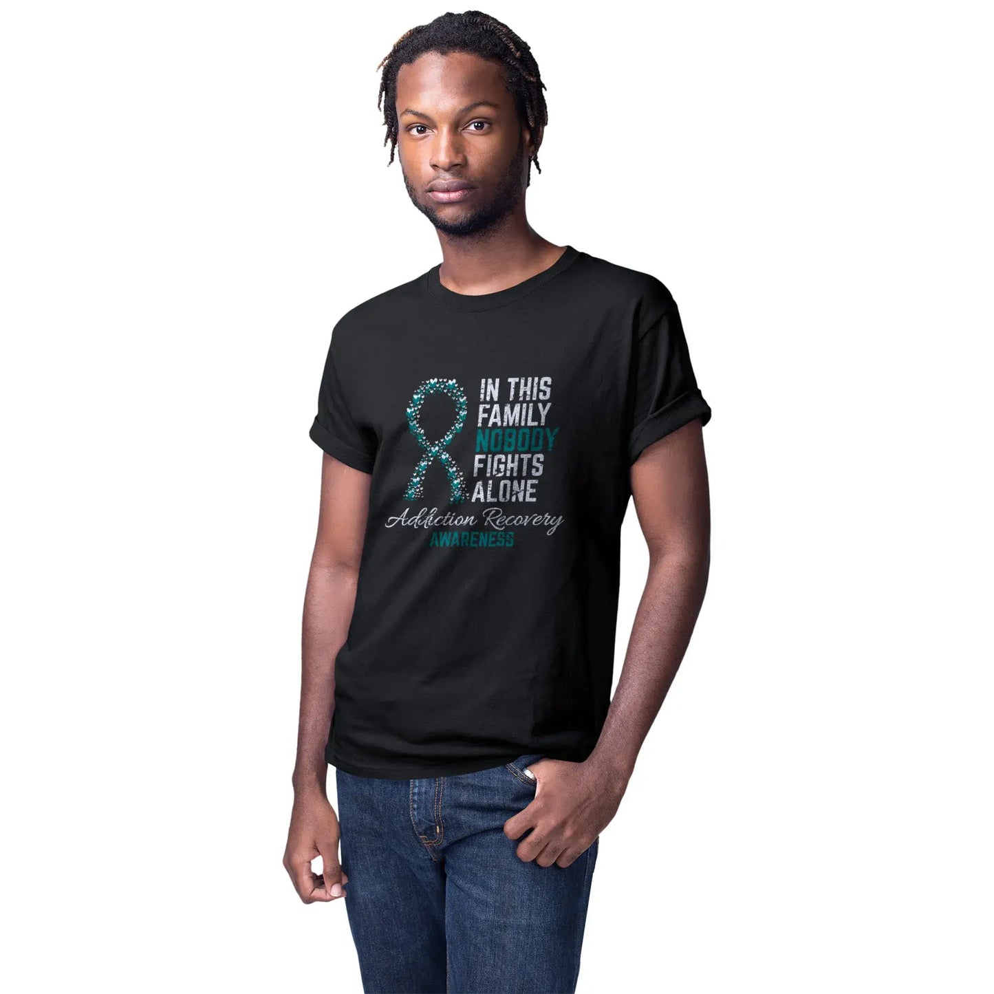 Man modeling addiction recovery support shirt with powerful quote and heart ribbon design.