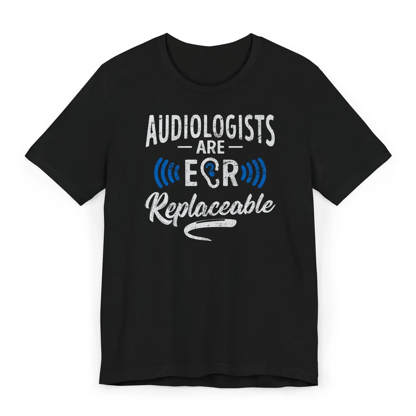 Flatlay of Audiology Chick shirt with cartoon bird and waves