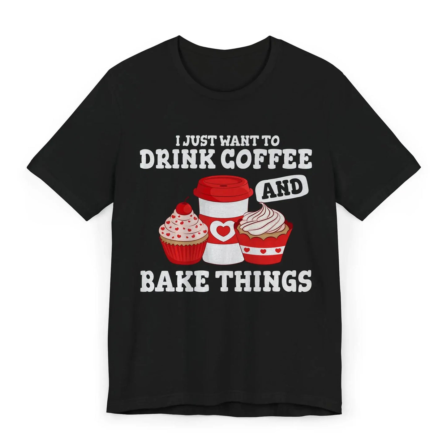 Flat lay of black shirt with cupcakes and text I Just Want to Drink Coffee and Bake Things
