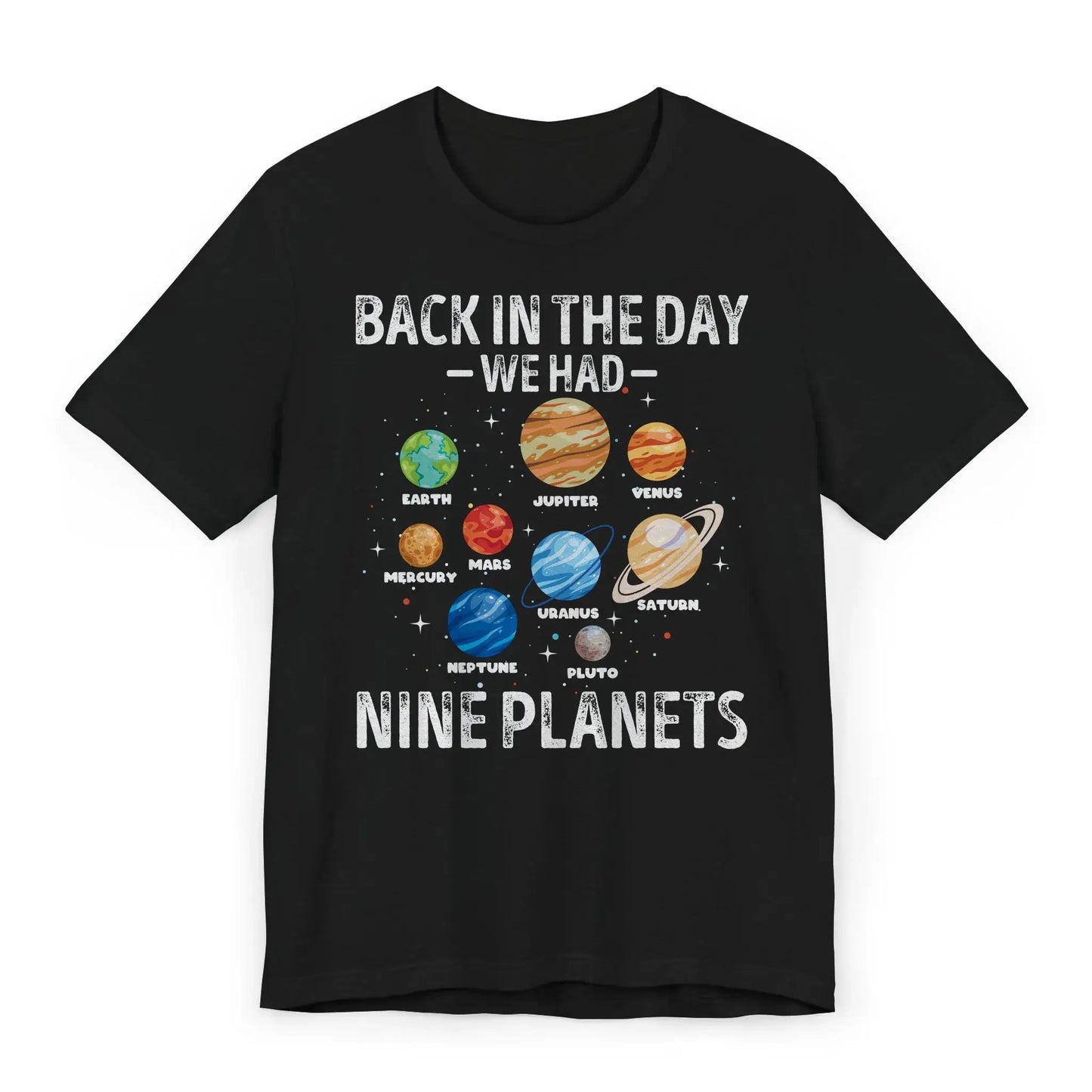 Flatlay of Nine Planets solar system shirt with Pluto included