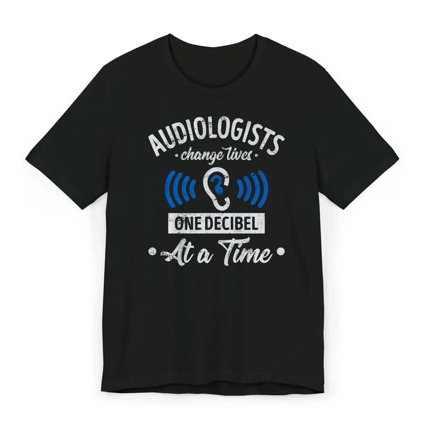 Flatlay of One Decibel at a Time shirt for hearing professionals