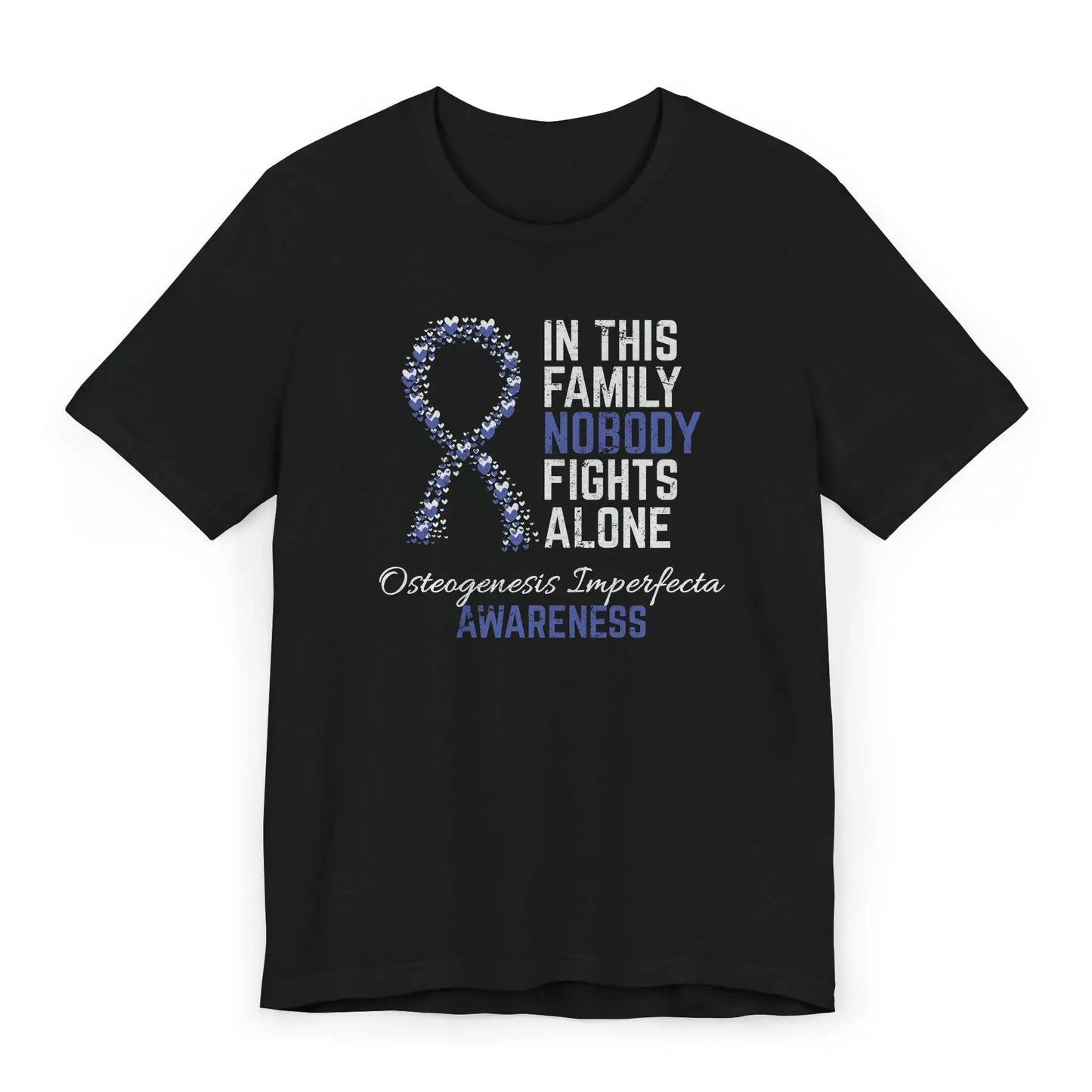 The flat image shows an Osteogenesis Imperfecta Awareness T-shirt with a heart-filled ribbon and quote for those living with brittle bone disease.
