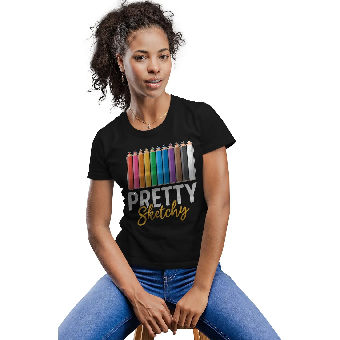 Woman in Pretty Sketchy artist tee with sketchbook humor