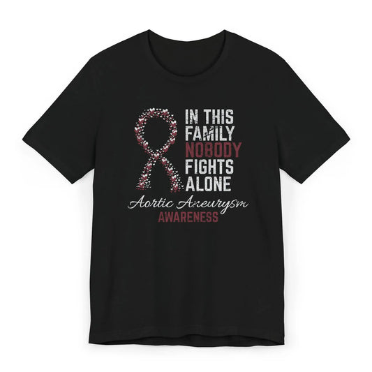 Aortic aneurysm awareness shirt with red heart ribbon and quote “In This Family No One Fights Alone” supporting early detection and survivor strength.