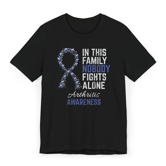 The flat image shows an Arthritis Awareness T-shirt with a heart-filled ribbon and quote supporting those with rheumatoid and juvenile arthritis.