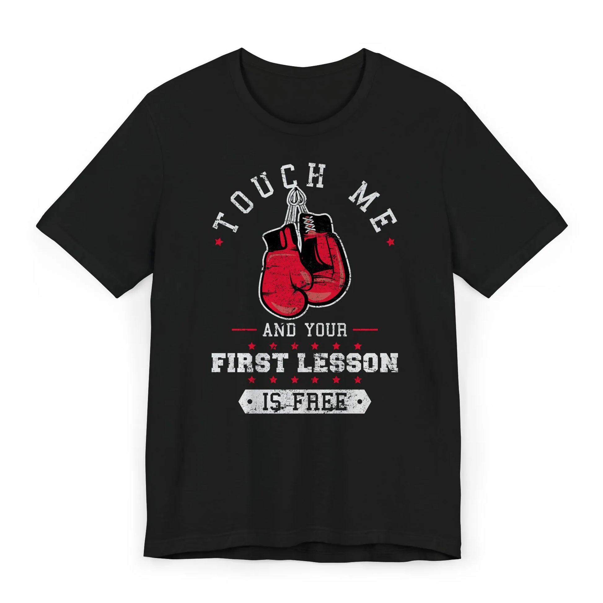 Flat lay of a boxing shirt with red gloves and quote "Touch Me and Your First Lesson Is Free."