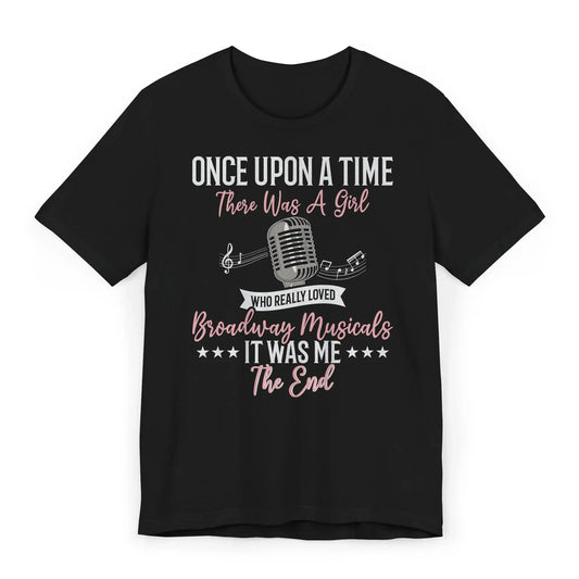 Flat lay of Broadway musical girl shirt with fairytale quote and mic graphic.