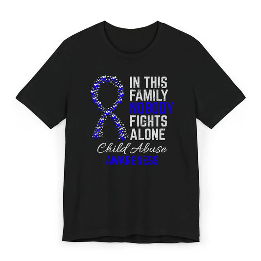 Flat image of the Child Abuse Awareness T-shirt with heart-filled ribbon and quote to support survivors and raise visibility for child protection.
