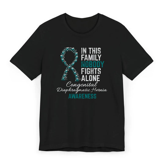 Flat image of the CDH awareness T-shirt with a heart-filled ribbon and the quote “In This Family No One Fights Alone.”