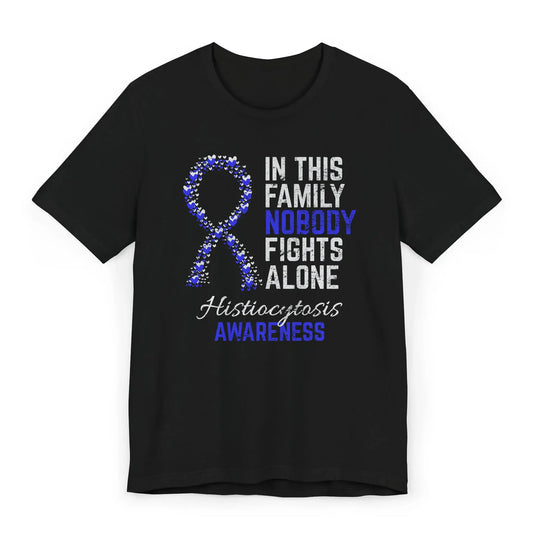 Flat image of the histiocytosis awareness T-shirt with a heart-filled ribbon and the quote “In This Family No One Fights Alone.”