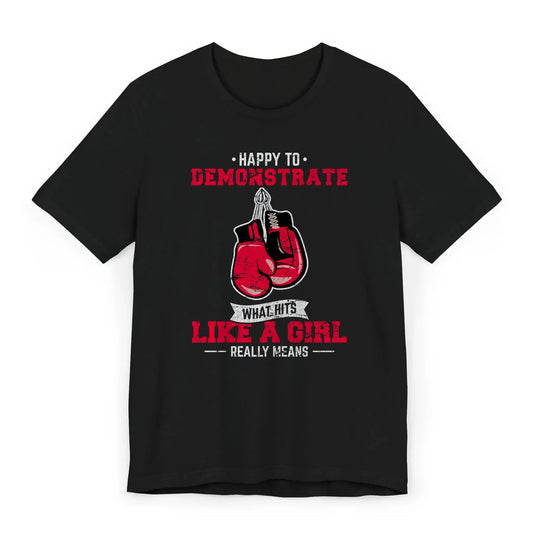 Flat image of a boxing shirt with red gloves and quote "Hits Like a Girl" – a strong message for female fighters.