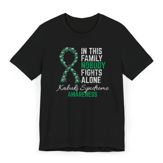 Flat image of the Kabuki Syndrome Awareness T-shirt with a teal and pink ribbon and quote showing love and support for rare warriors.