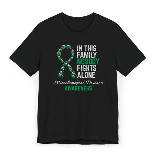 The flat image shows a Mitochondrial Disease Awareness T-shirt with a heart-filled ribbon and quote to support those battling chronic energy disorders.