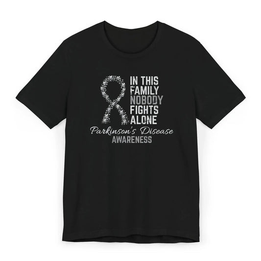 The flat image shows a Parkinson’s Disease awareness T-shirt with a heart-filled ribbon and message supporting strength and unity through the journey.