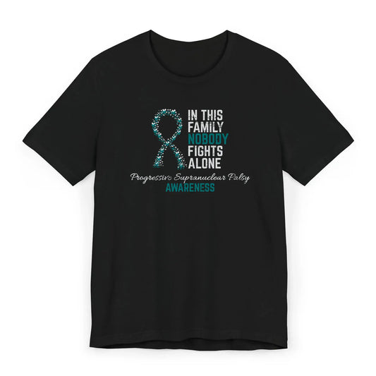 Flat image of the progressive supranuclear palsy awareness T-shirt with a heart-filled ribbon and the quote “In This Family No One Fights Alone.”