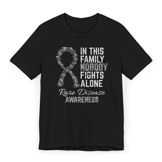 Flat image of the Rare Disease Awareness T-shirt with ribbon and quote to support individuals facing rare conditions and raise visibility.