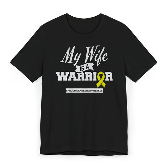 Flat image of a “My Wife Is a Warrior” Sarcoma Awareness T-shirt with a yellow ribbon showing strength and rare cancer awareness.