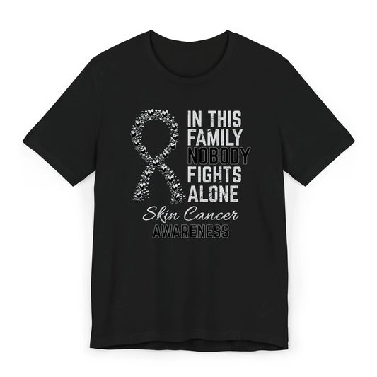 Flat image of the Skin Cancer Awareness T-shirt with heart-filled ribbon and empowering quote for skin cancer fighters and supporters.