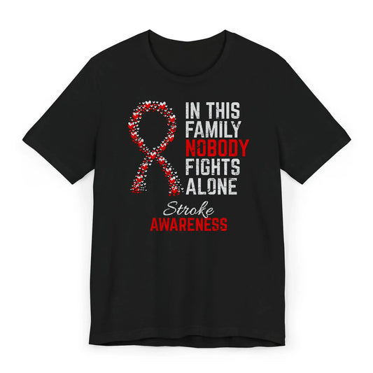 Flat image of the Stroke Awareness T-shirt with a red ribbon and quote offering strength and support through recovery.