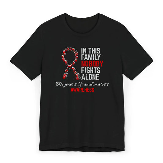 Flat image of the Wegener’s Granulomatosis Awareness T-shirt with heart-filled ribbon and a message of strength for rare disease warriors.